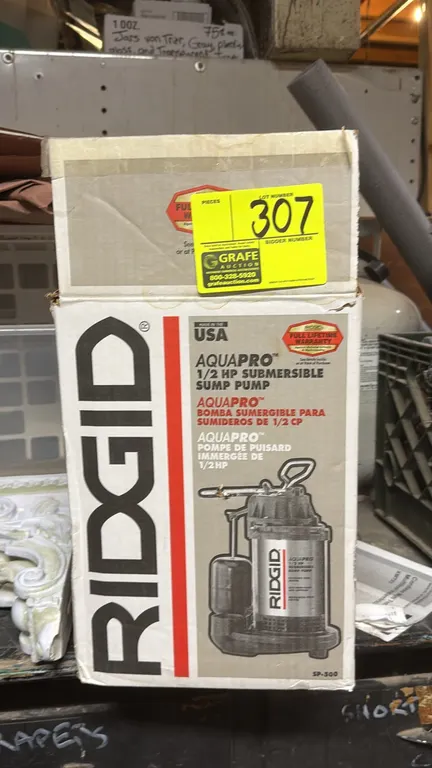 Ridgid AquaPro SP-500 submersible sump pump. Features 1/2 HP motor and vertical float switch. Includes original box packaging.
