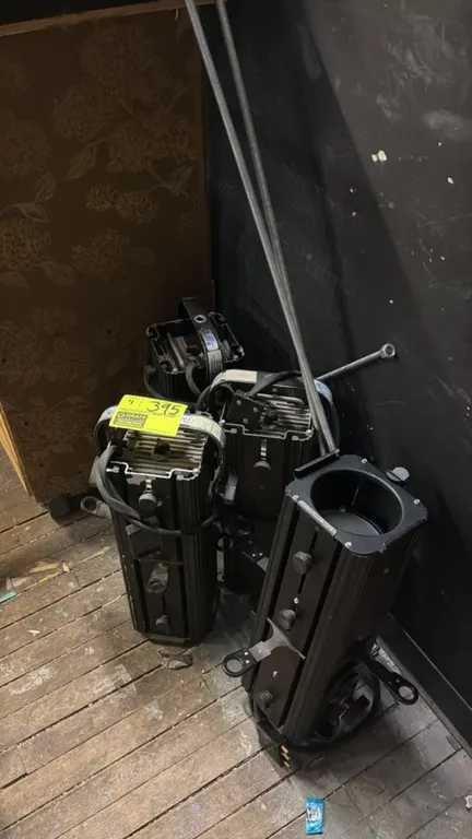 Altman 4.5-2550Z-MT theatrical spotlight fixtures. Features zoom lens assembly, four framing shutters, gel frame holder, and mounting yokes. Electrica