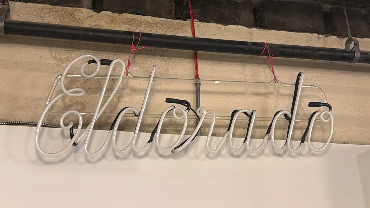 Quantity of Neon lighting- including "Eldorado" script neon sign and additional neon. Features white neon glass tubing mounted to a clear acrylic back