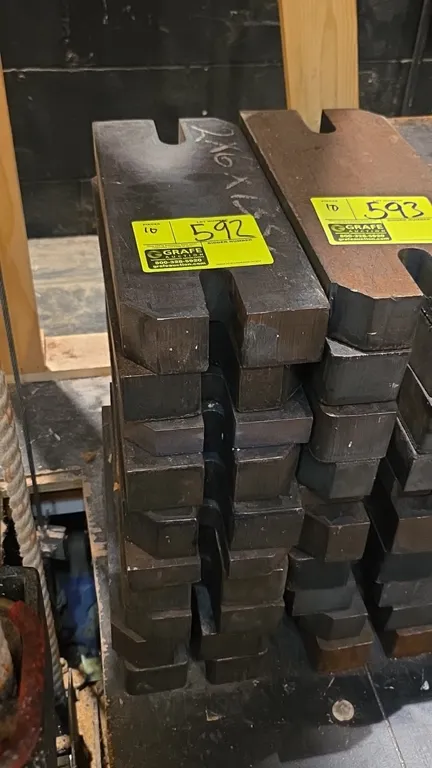 Stage weights. Slotted counterweight design. Dimensions: 14" x 2".