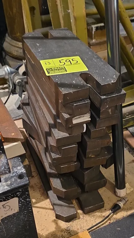 Slotted theatrical stage weights. Features notched cutouts for counterweight arbor systems. 14" x 2".