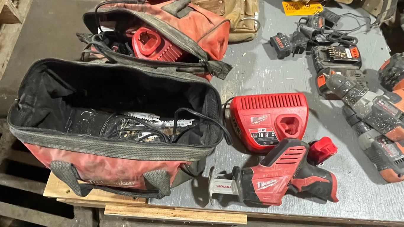 (2) Tool Pouches, (2) Black and Decker Cordless Drills, (1) Milwaukee Cordless Reciprocating Saw