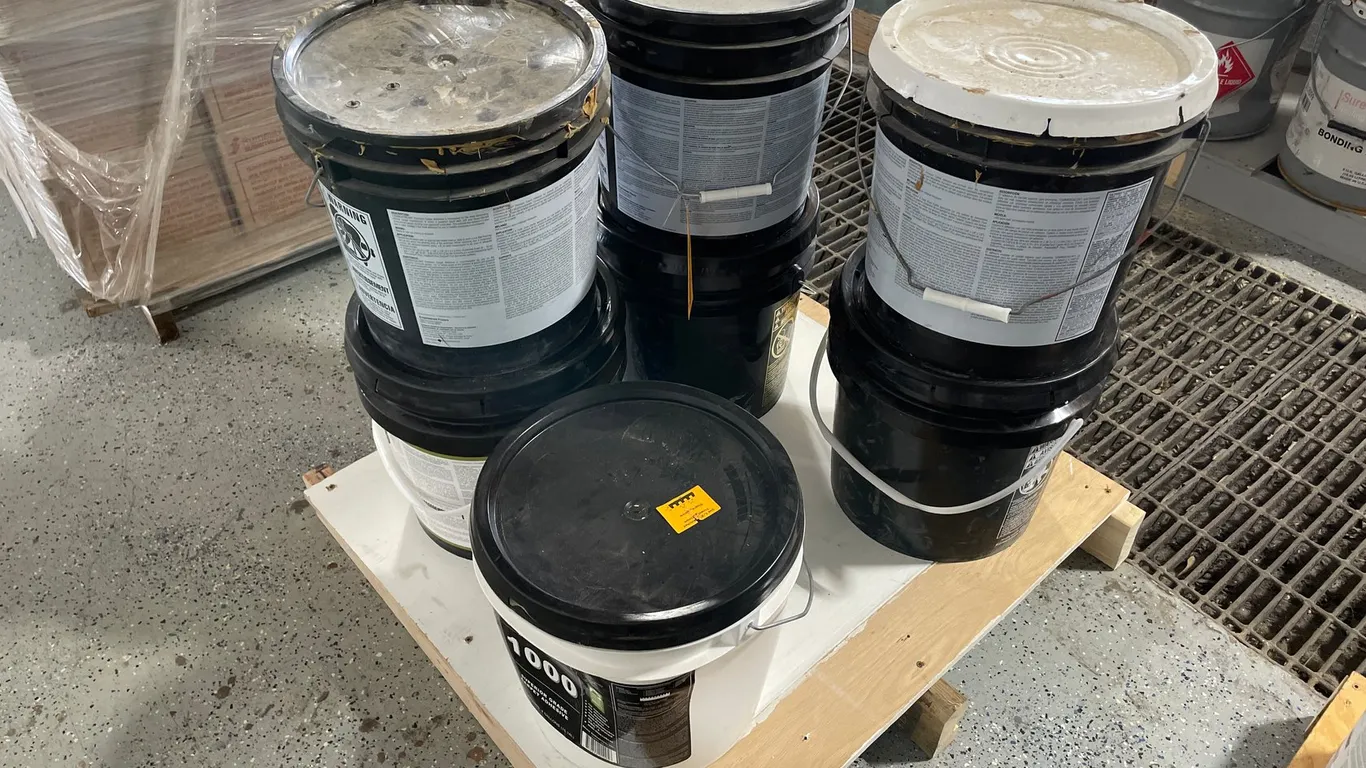 Pallet of Various Carpet and Adhesive