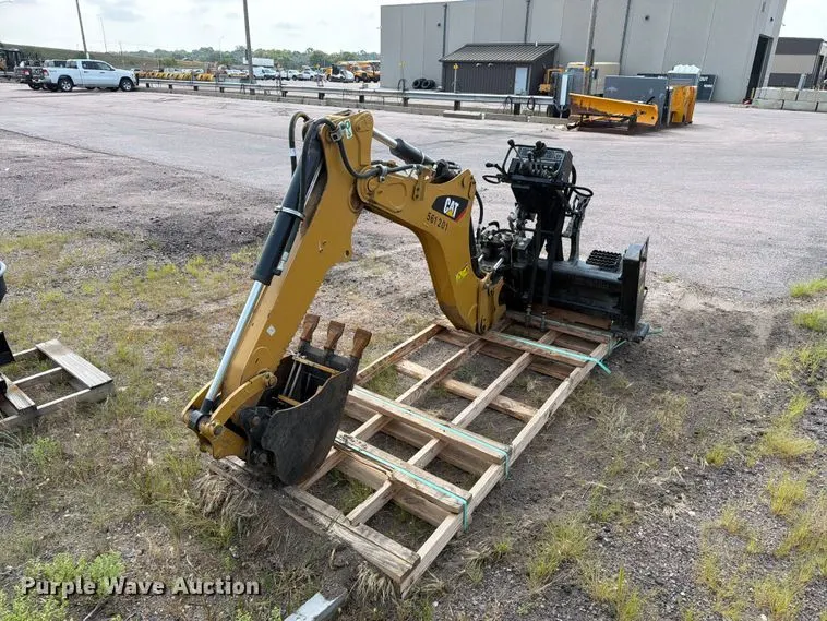 2013 Caterpillar BH150 skid steer backhoe