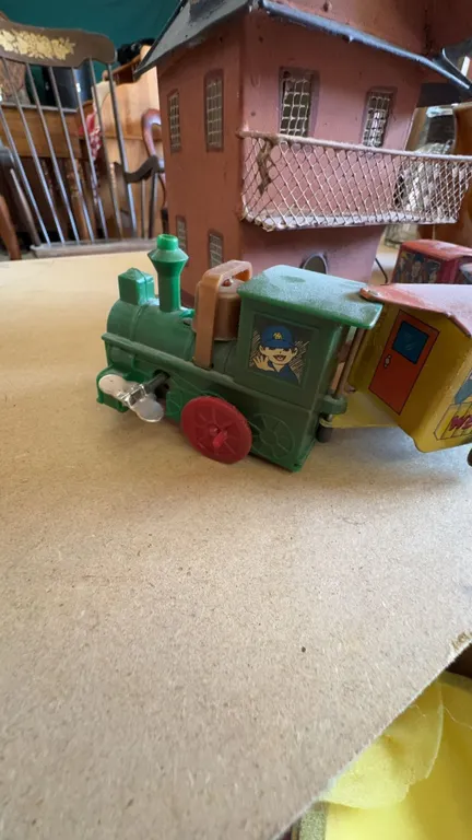 Wind-Up Tin Toy Train Set With Comic And Western Cars