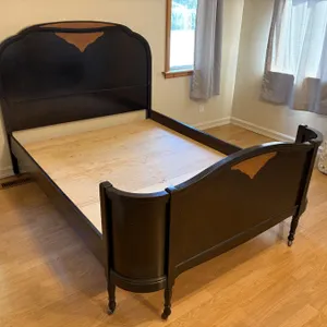 Wooden double  bed frame with a decorative wood inlay feature on both the headboard and footboard. T
