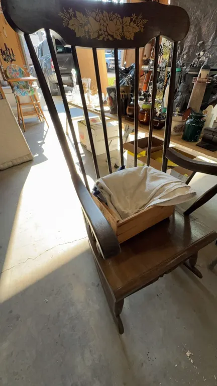 Wooden Spindle-Back Rocking Chair with Floral Motif