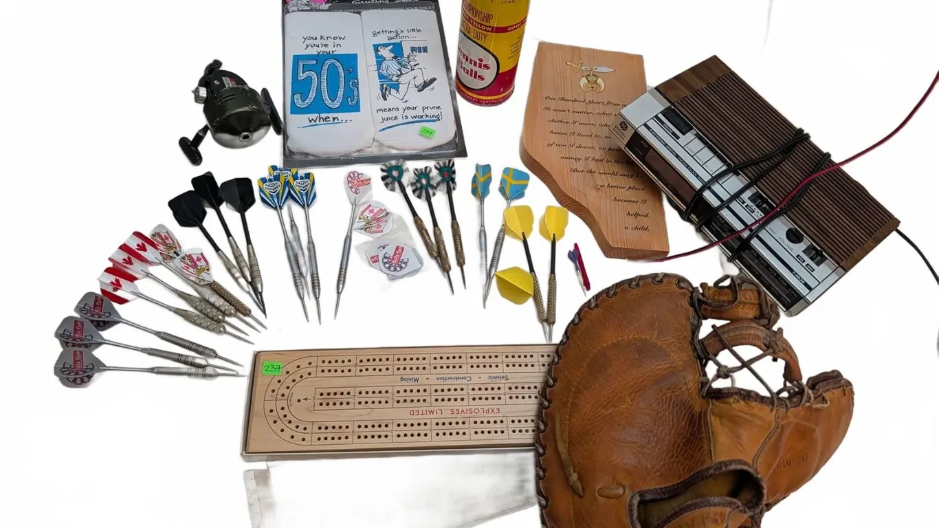 Lot: Darts, Cribbage Board, Spalding Glove, GE Clock Radio