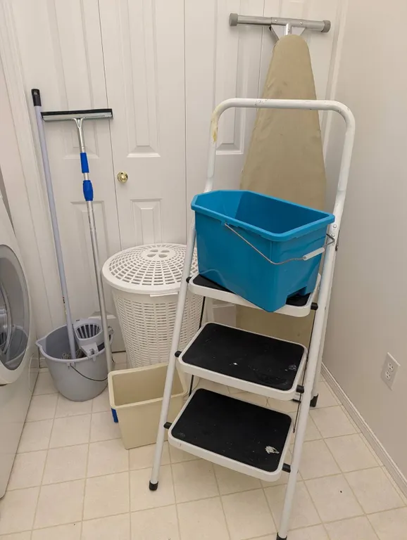Laundry Room Utility Lot With Ladder, Mop, Bins, and Ironing Board