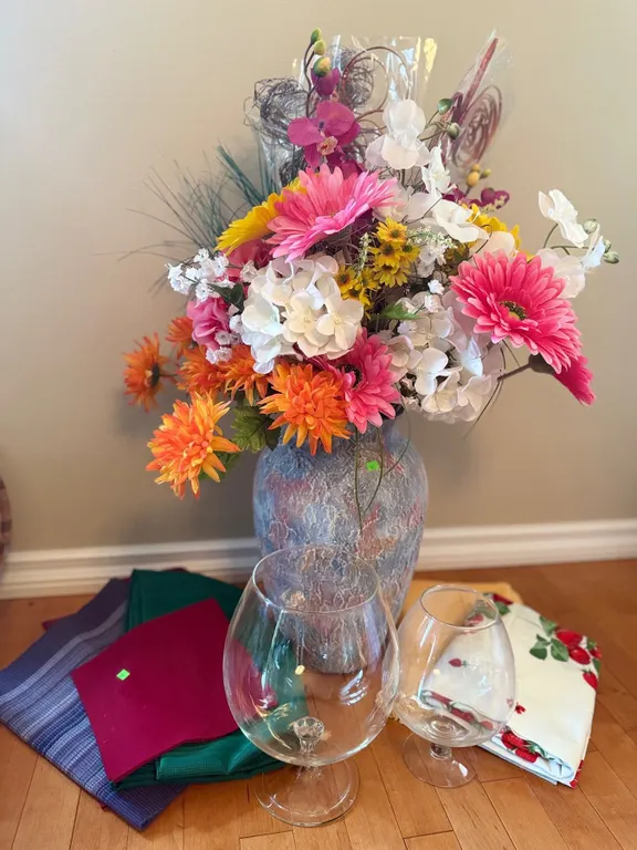 Decorative Vase with Silk Flower Arrangement, Two Oversized Glasses, and Assorted Table Linens