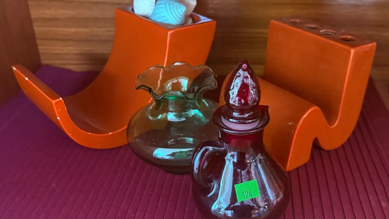 Glass Bottles and Orange Ceramic Flower Holders