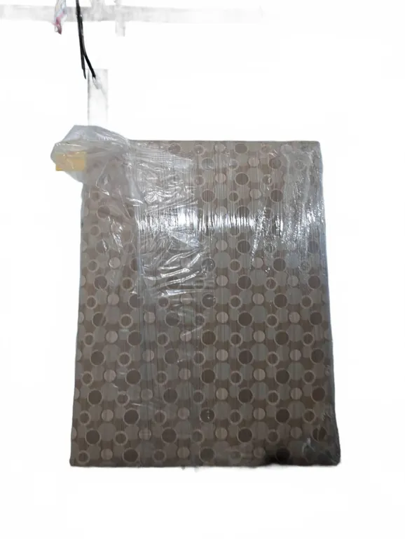 Queen Size Headboard Wrapped in Plastic