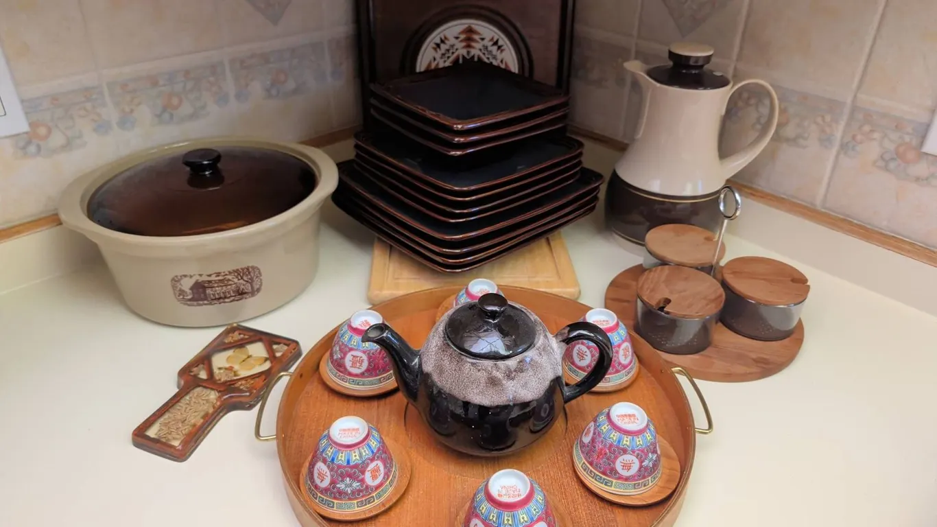 Kitchenware Lot Including Amana Country Cooker, Tea Set, and Sears Plates