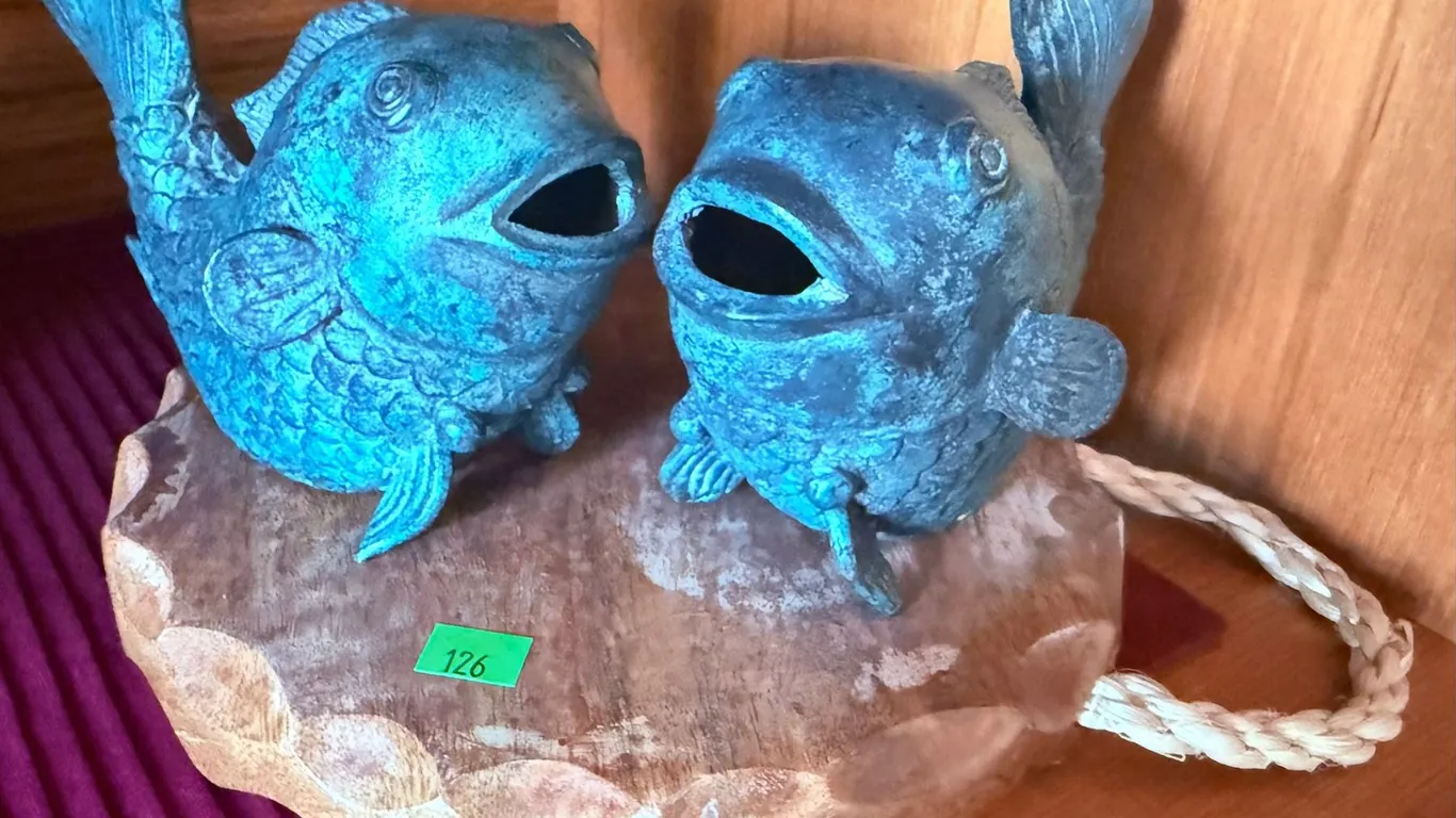Cast Metal Fish Figurines on Wooden Serving Board