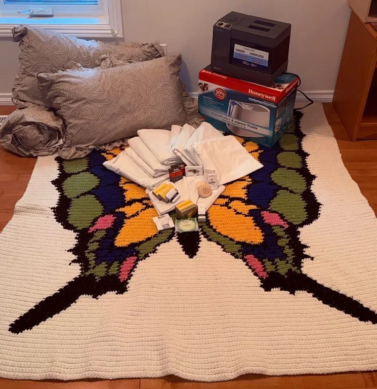 Household Lot with Crochet Butterfly Blanket, Humidifiers, Linens, and Pillows