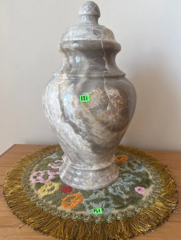 Polished Onyx Lidded Urn and Assorted Embroidered Doilies