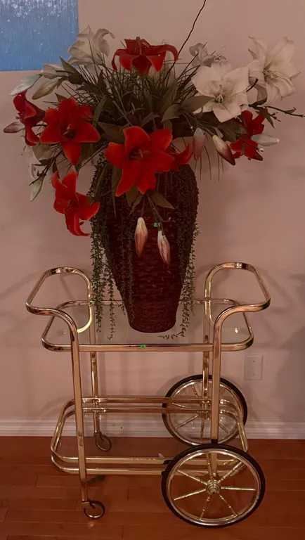 Gold-Tone Metal and Glass Two-Tier Bar Cart with Large Vase and Artificial Flowers