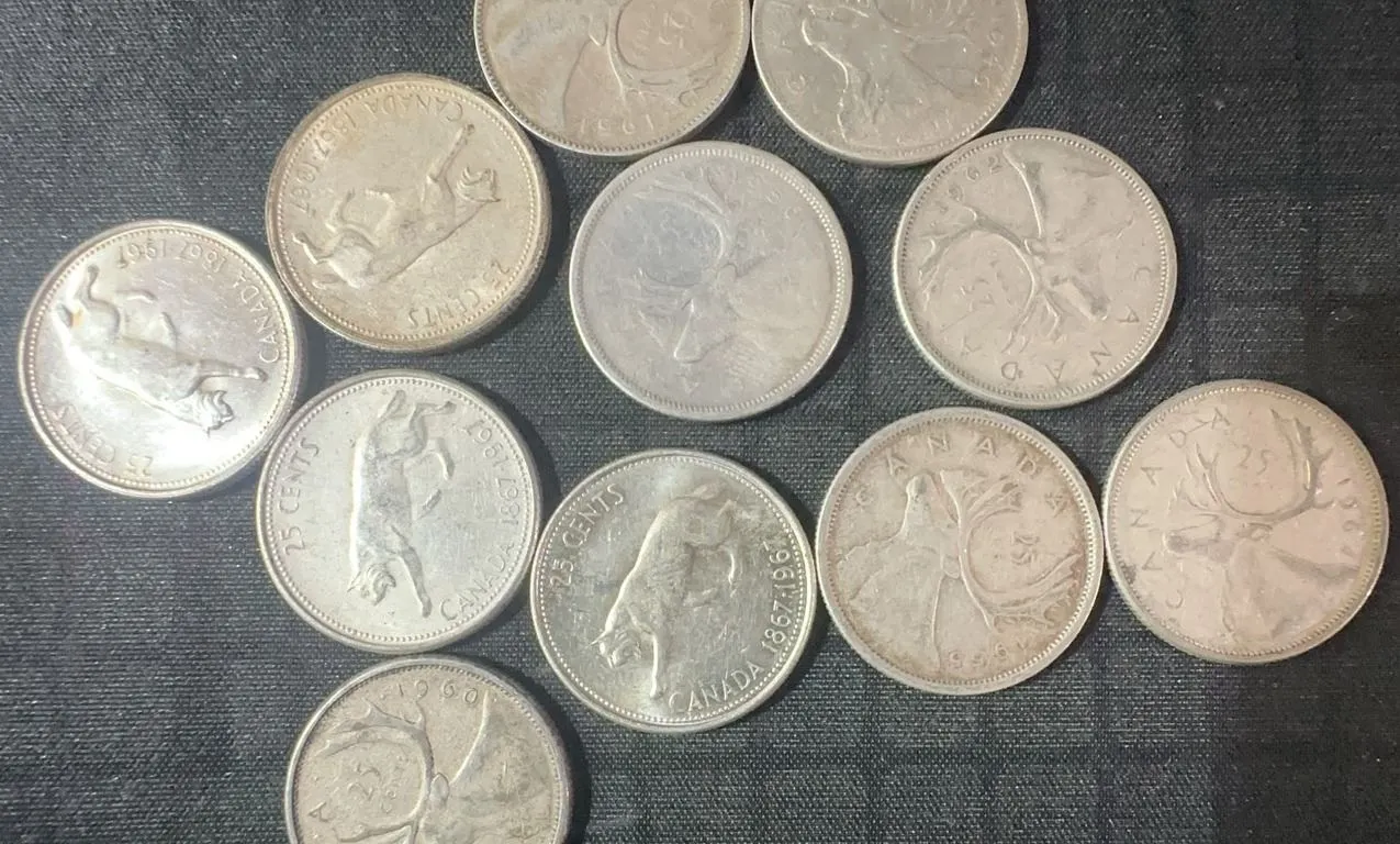 11 Canadian .800 Silver Quarters, 64g, 1.65 Troy Ounces Total