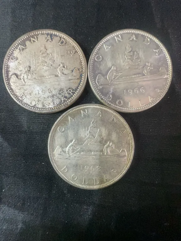 Three .800 Silver Canadian Dollar Coins, 1962 and 1965, 70g Total