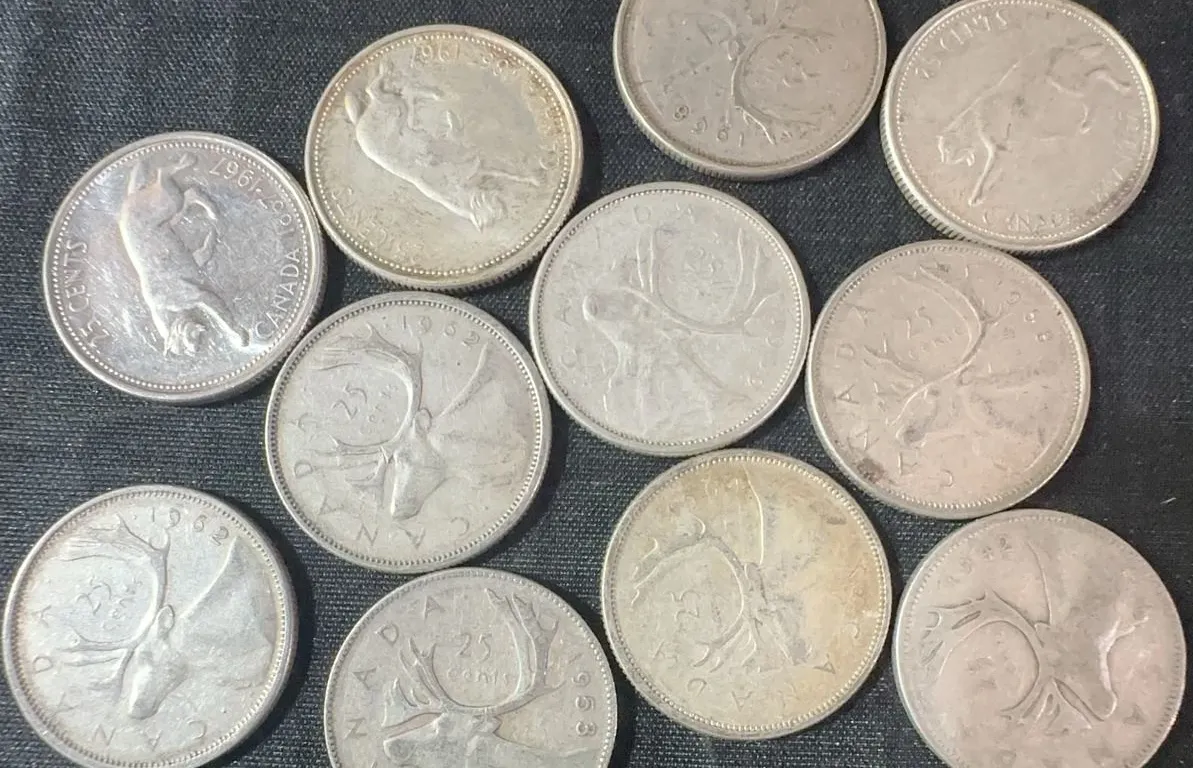 11 Canadian .800 Silver Quarters, 64g Total, 1.65 Troy Ounces