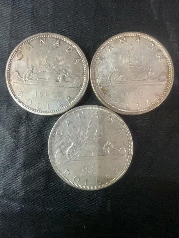 Three .800 Silver Canadian Dollar Coins, 1963 and 1965, 70g Total