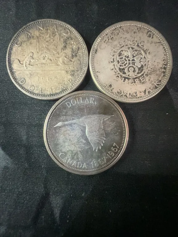 Three .800 Silver Canadian Dollar Coins, 1965, 1966, and 1967, 70g