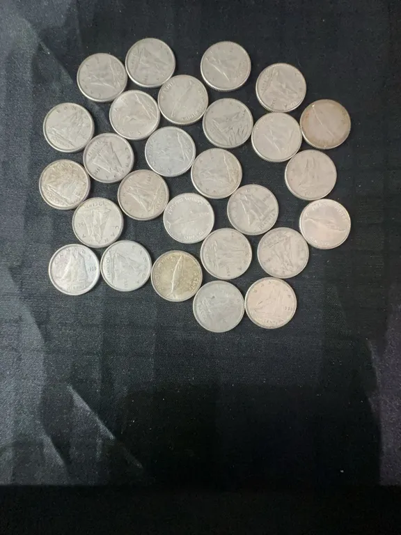 27 .800 Silver Canadian Dimes, 63g, 1.62 Troy Ounces