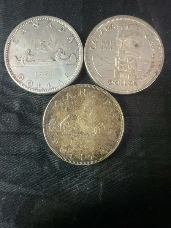 Three .800 Silver Canadian Dollar Coins, 70g Total
