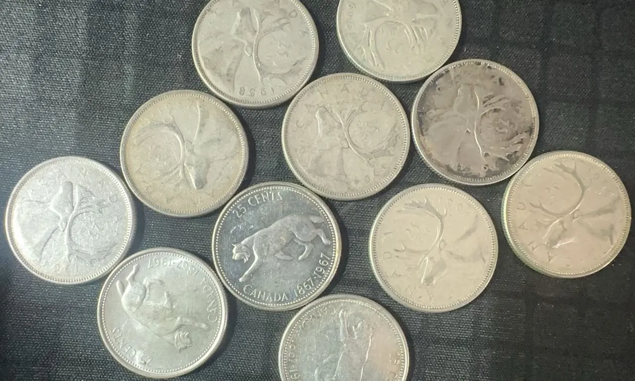 11 .800 Silver Canadian Quarters, 64g Total Weight