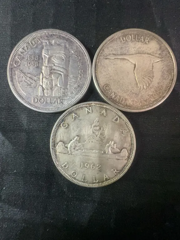 Three .800 Silver Canadian Dollar Coins, 70g Total Weight