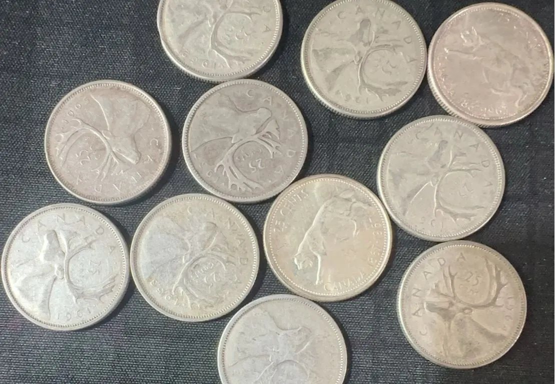 11 .800 Silver Canadian Quarters, 64g Total Weight