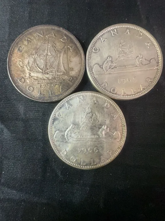 Three .800 Silver Canadian Dollar Coins, 70g Total Weight