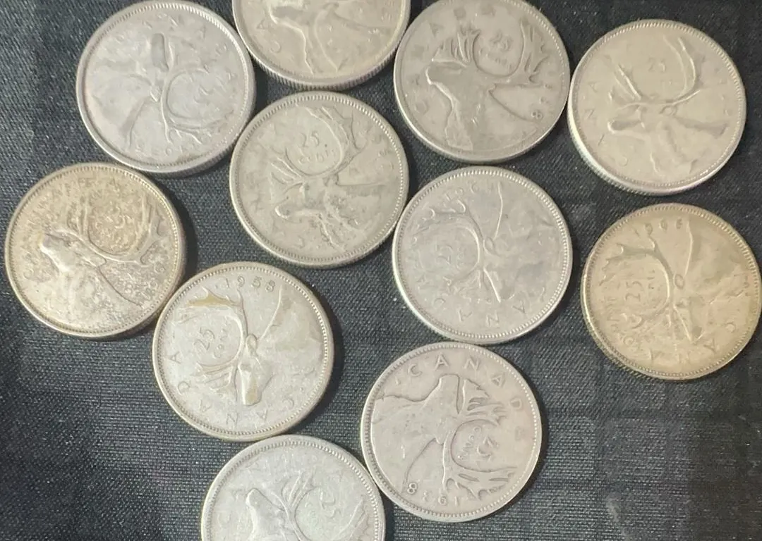 11 Canadian .800 Silver Quarters, 1.65 Troy Oz, 64g Total