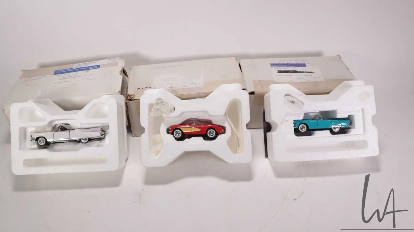 3 1:43 scale Franklin Mint die cast collectible cars including 1957 Ford Thunderbird, 1957 Chevrolet