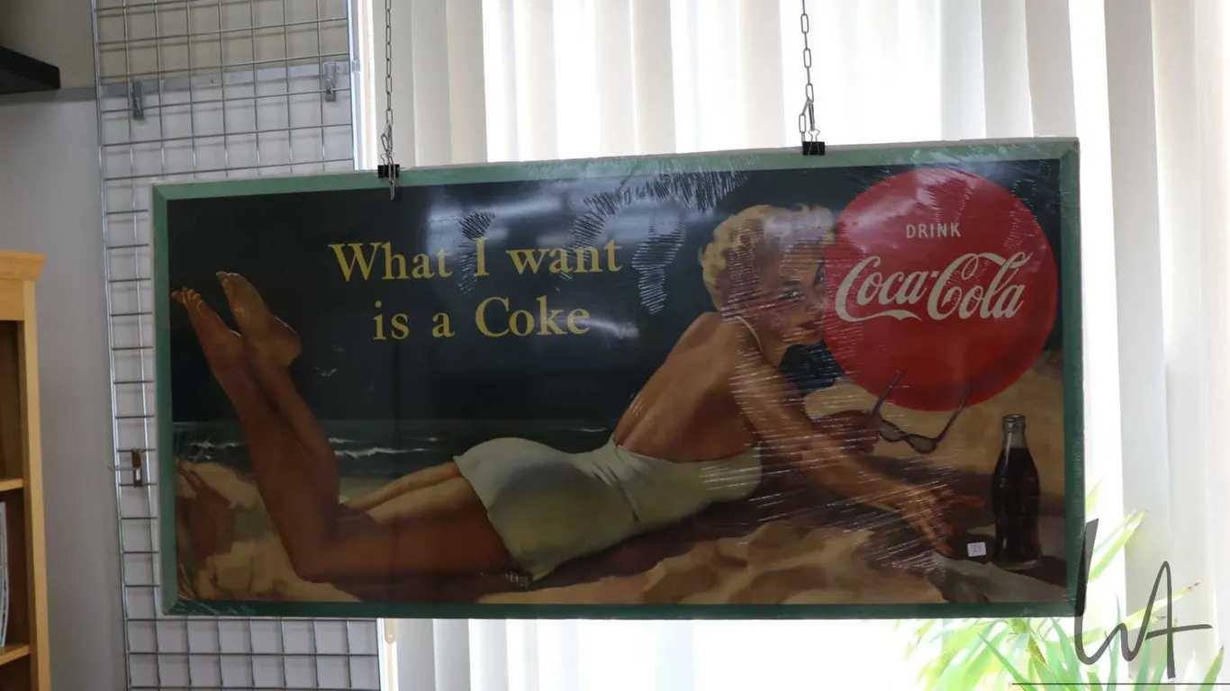 Cardboard Coca-Cola advertising sign marked Lithograph in Canada, 27 1/2" H X 57" W