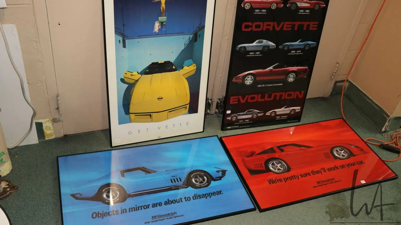 4 framed Corvette posters including "Corvette Evolution 1953-1990", all approx 36" wide x 24" tall