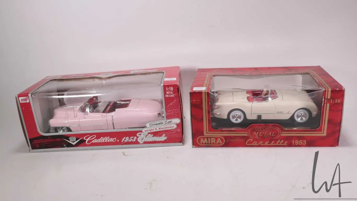 2 1:18 scale collectible die cast cars including Mira 1953 Chevrolet Corvette and an Anson 1953 Cadi