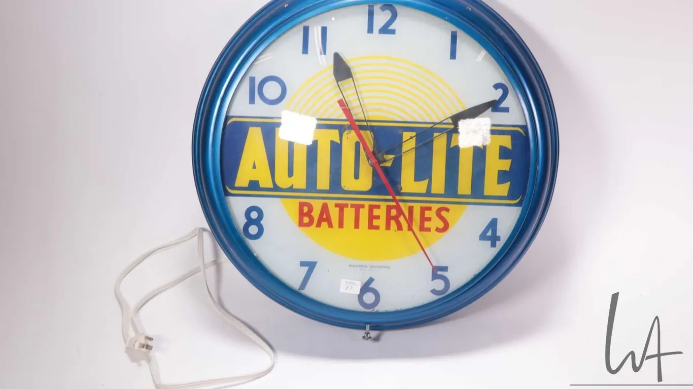 Vintage Auto-Lite Batteries electric wall clock, 19" in diameter, working at time of cataloguing
