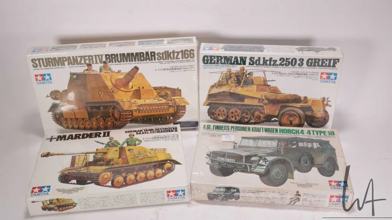 Four 1:35 scale Tamiya WWII vehicle model kits, all new in box
