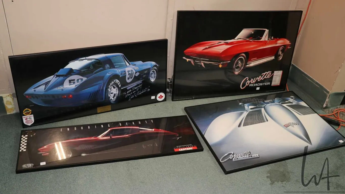 4 framed Corvette photographic prints including a blue mid 60's Corvette picture signed by Dick Guld