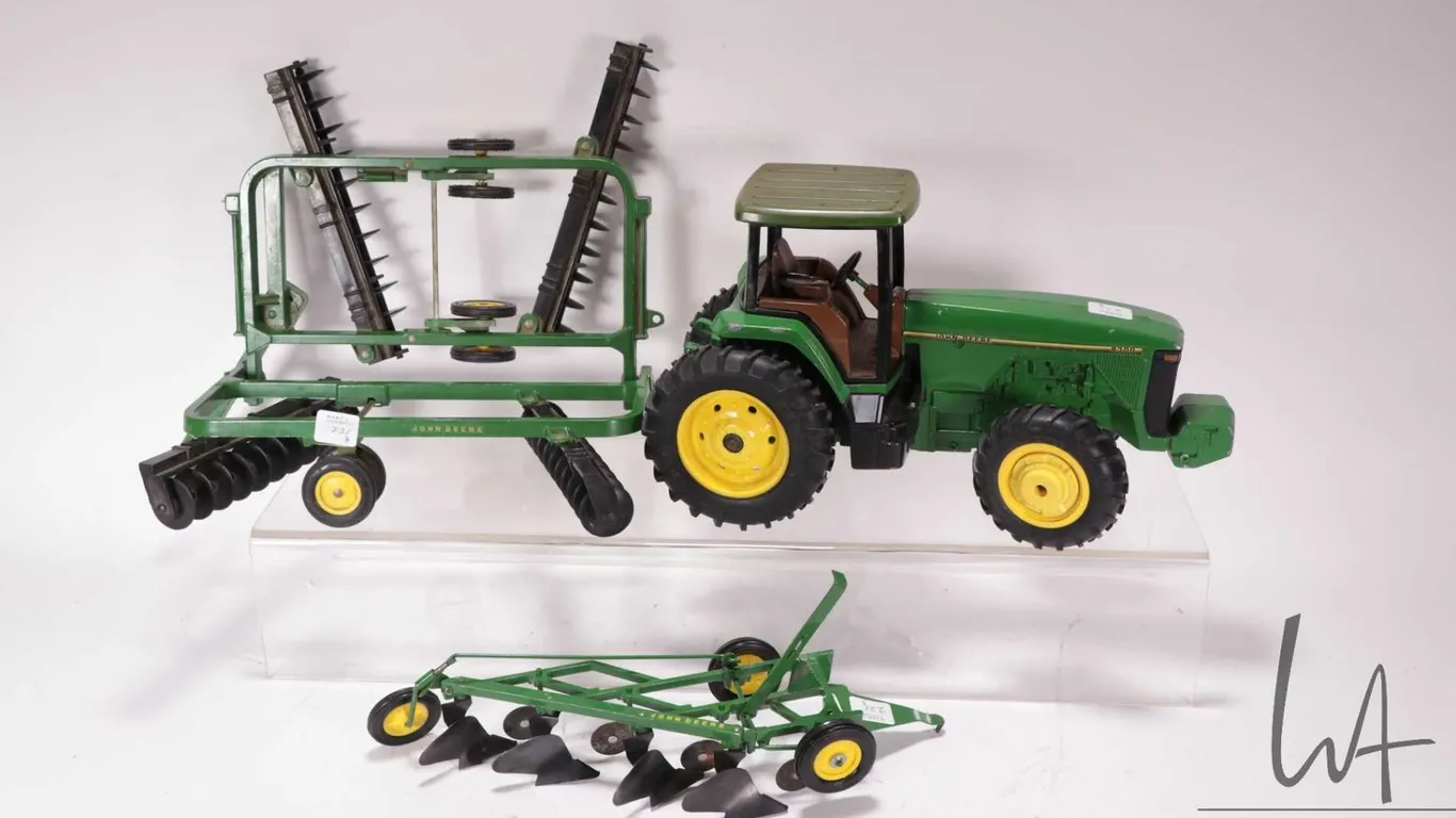 Ertl John Deere 8300 tractor with folding disc and four bottom plow
