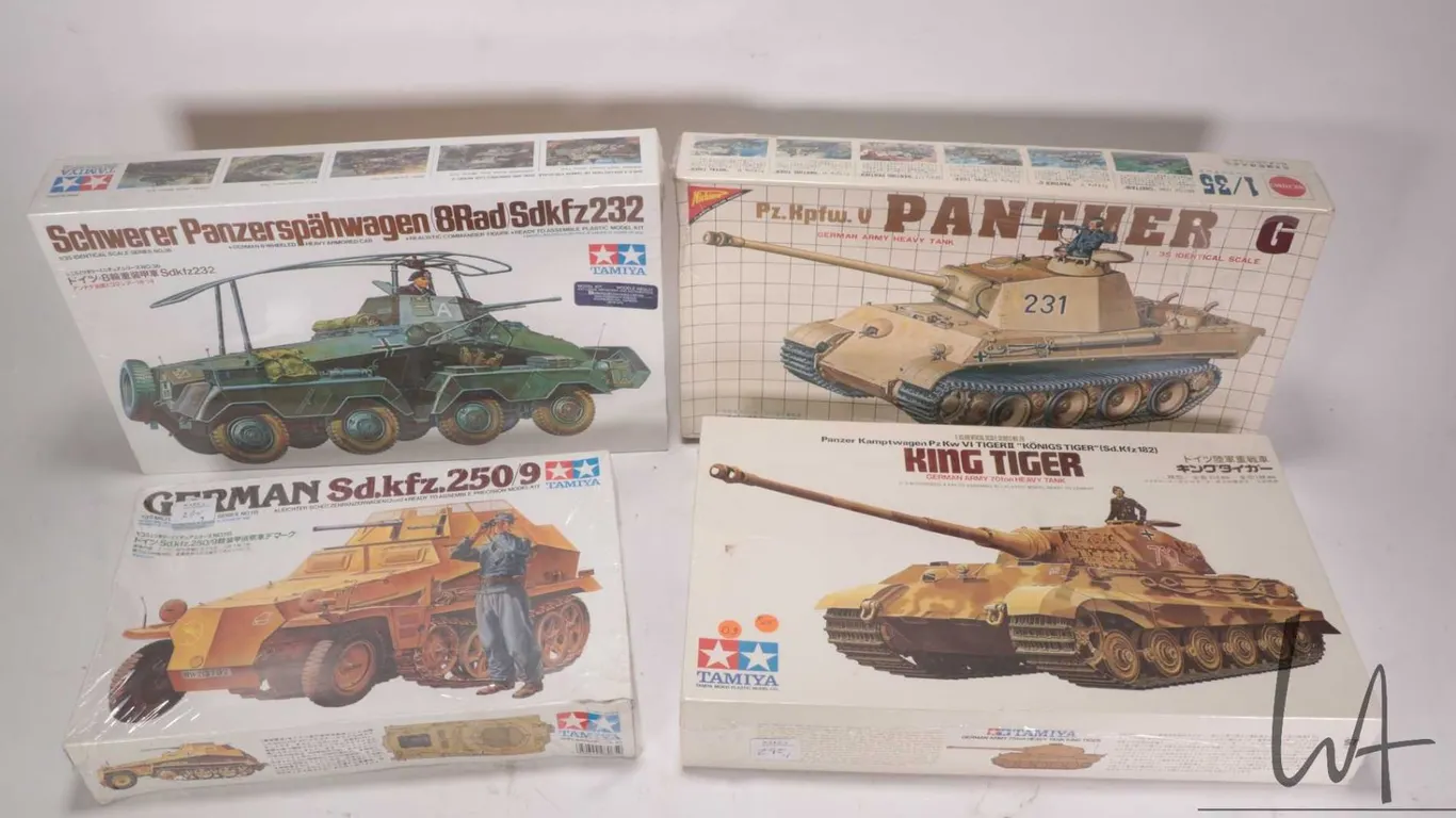Four 1:35 scale Tamiya WWII vehicle model kits, all new in box