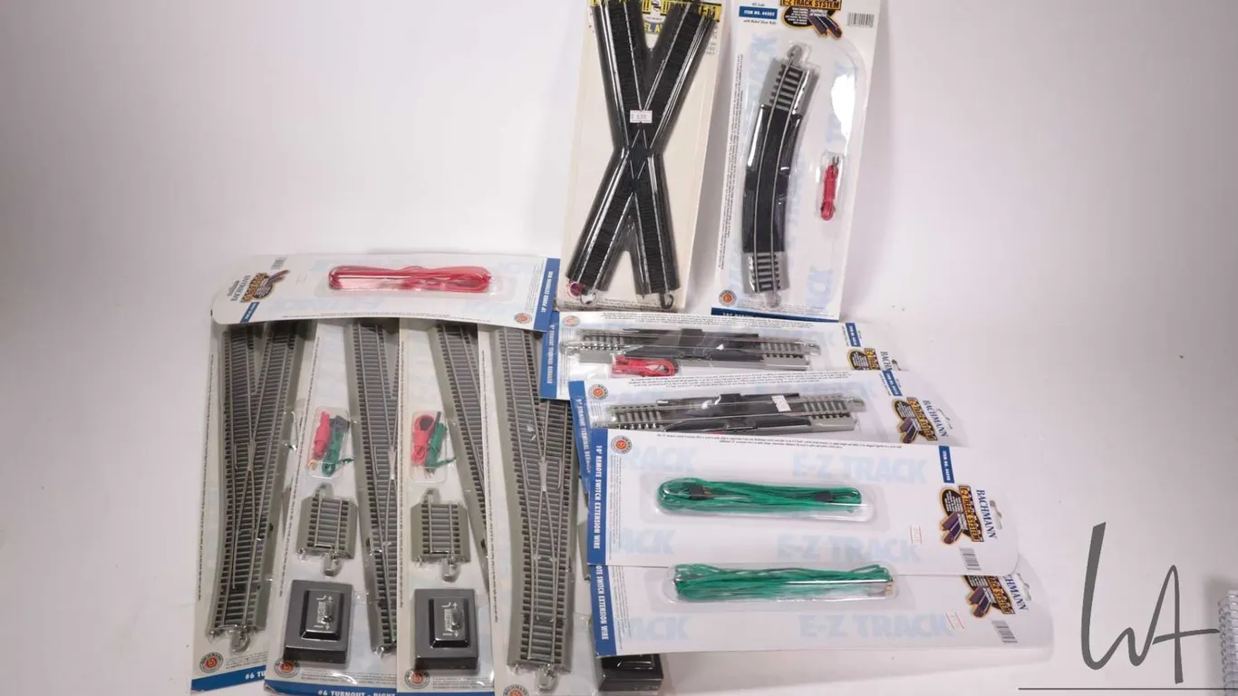 Selection of Bachmann E-Z Track System HO gauge track including two left turn-outs, two right turn-o