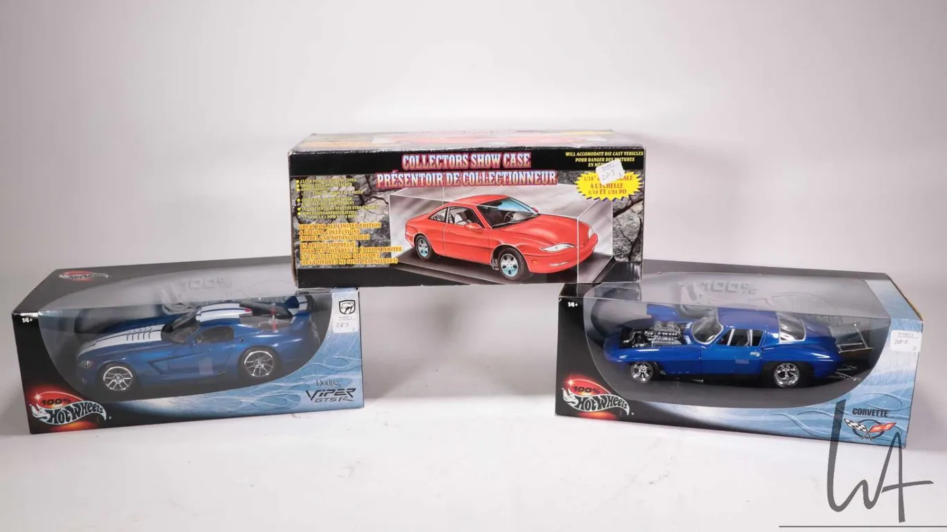 Two Hot Wheels die cast model cars including Dodge Viper GTSR, Corvette Dragster plus a die cast car