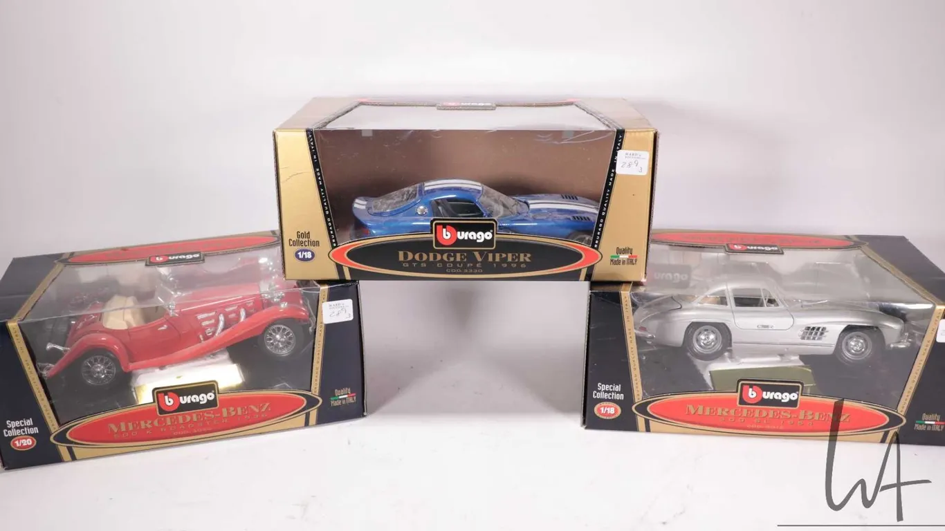 Three Burago die cast model cars including 1996 Dodge Viper GTS Coupe, 1954 Mercedes-Benz 300 SL and