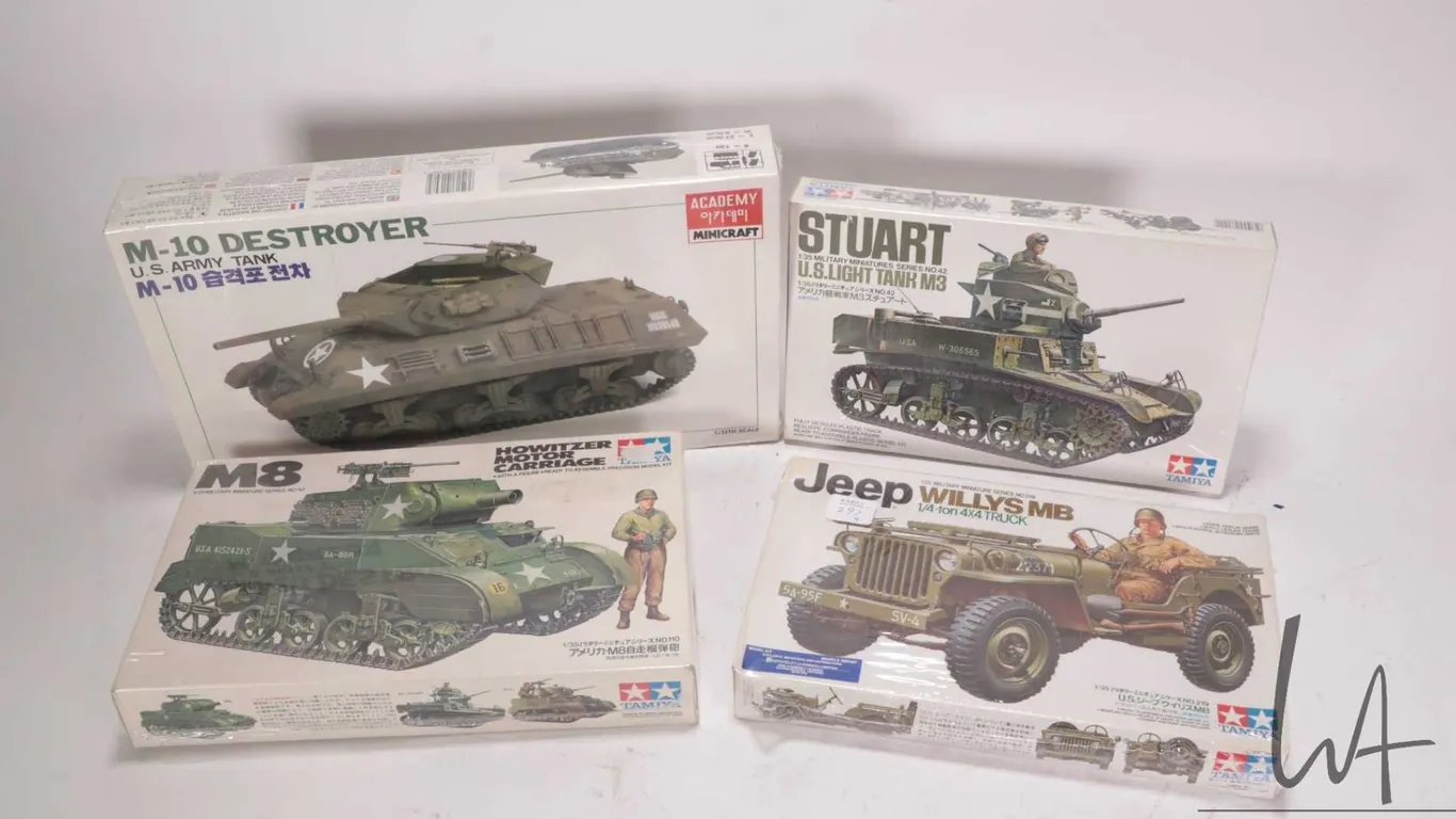 Four 1:35 scale Tamiya WWII vehicle model kits, all new in box