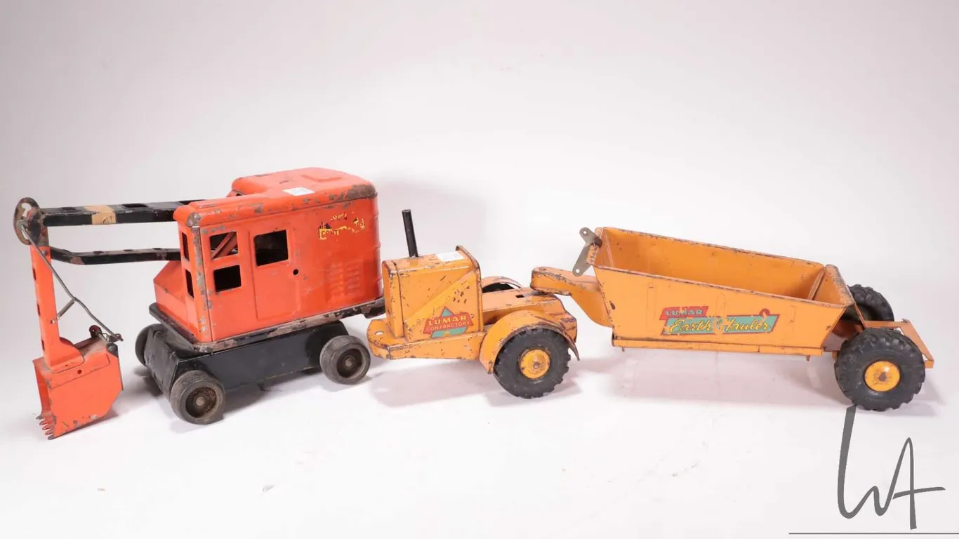 Two vintage pressed Marx steel toys including Lumar Earth Hauler and Lumar Excavator, note: both nee