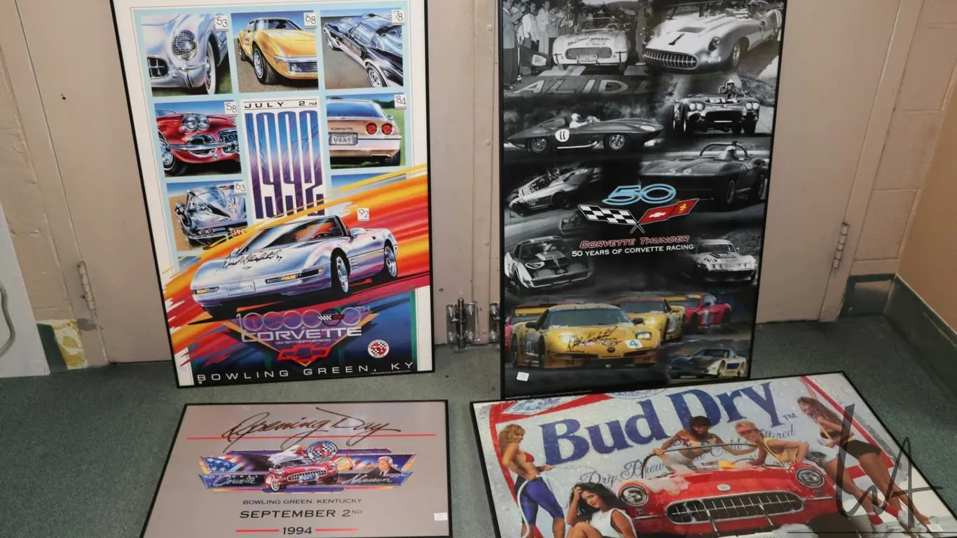 4 framed Corvette posters including "50 Years of Corvette Racing", signed by Dick Guldtsrand, and 2