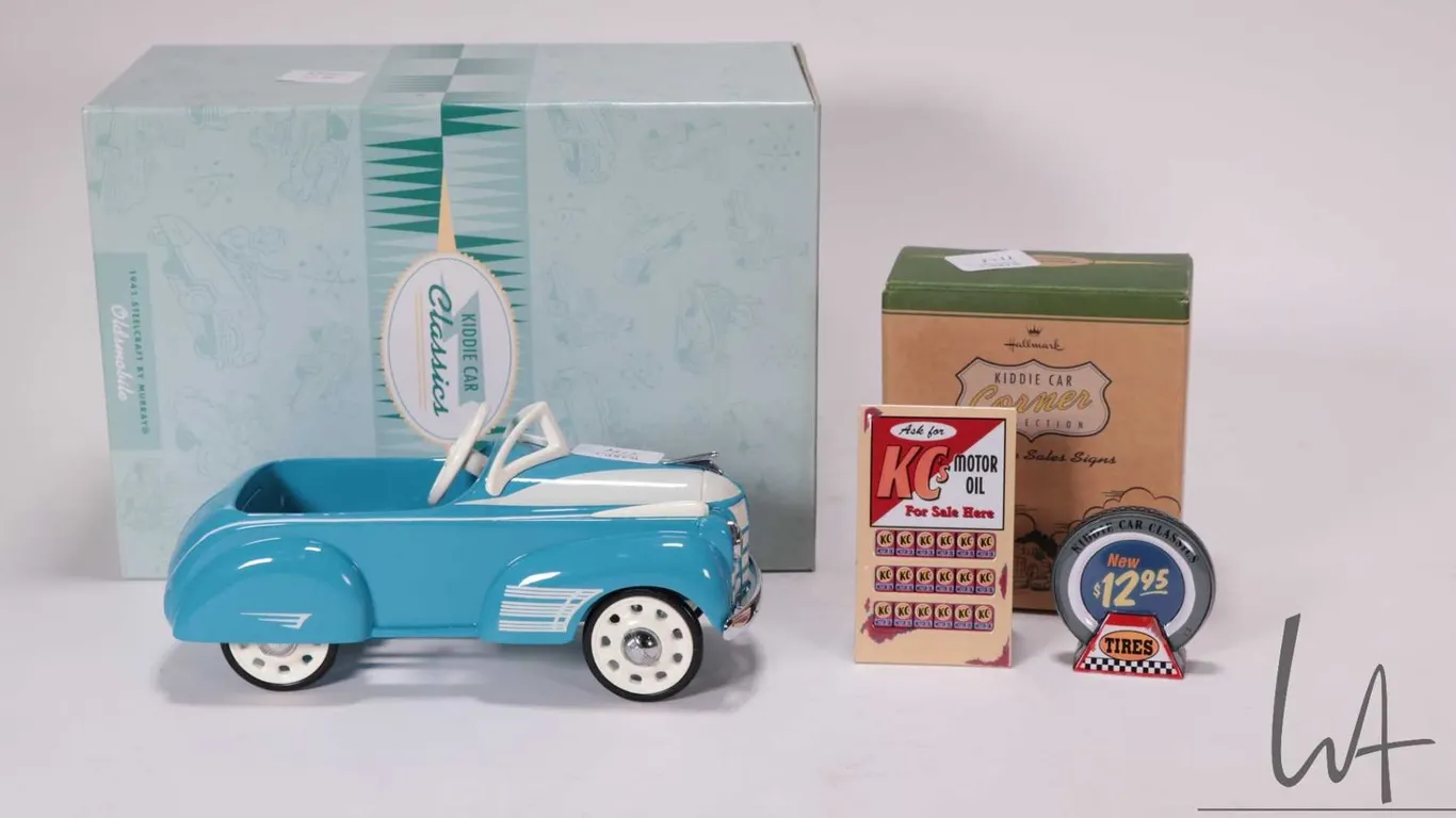Hallmark Kiddie Car Garage roadside billboard plus two metal service station signs and a Steelcraft