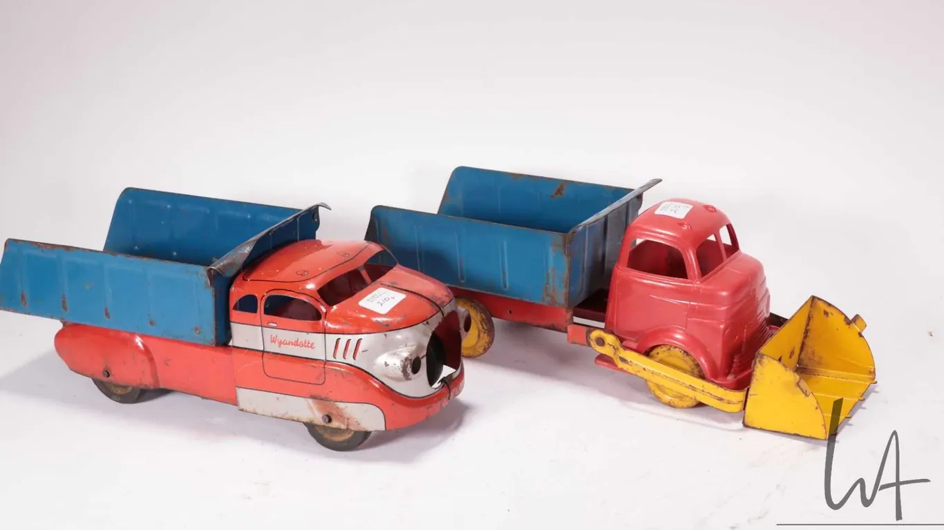 Two pressed steel toys including Wyandotte dump truck, 12" in length, note: missing grill and a Marx